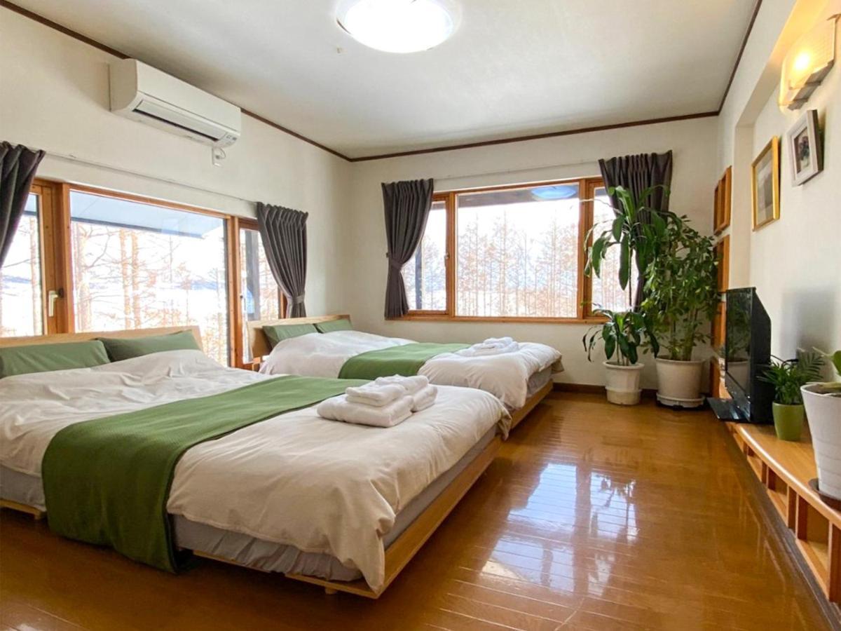 Ritz Garden Niji Guest House Бией Екстериор снимка