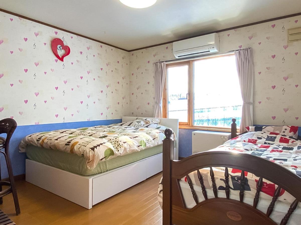 Ritz Garden Niji Guest House Бией Екстериор снимка