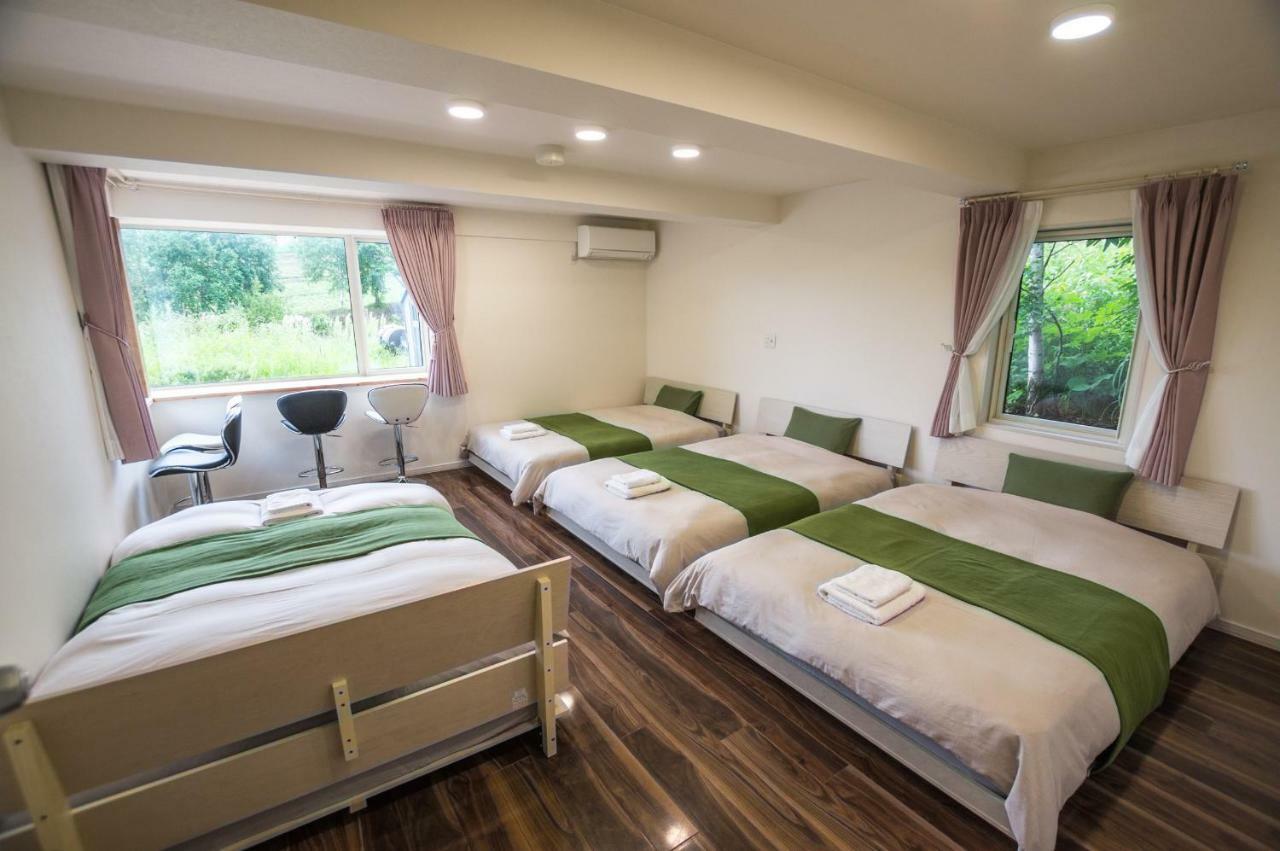 Ritz Garden Niji Guest House Бией Екстериор снимка
